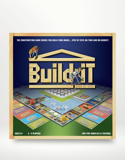 The image shows the cover of the board game 'Build-iT Step by Step', featuring a colorful design with the game's title prominently displayed, along with illustrations of houses and construction elements.